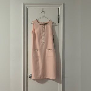 Karl Largerfeld pink sheath dress with pearl buttons.